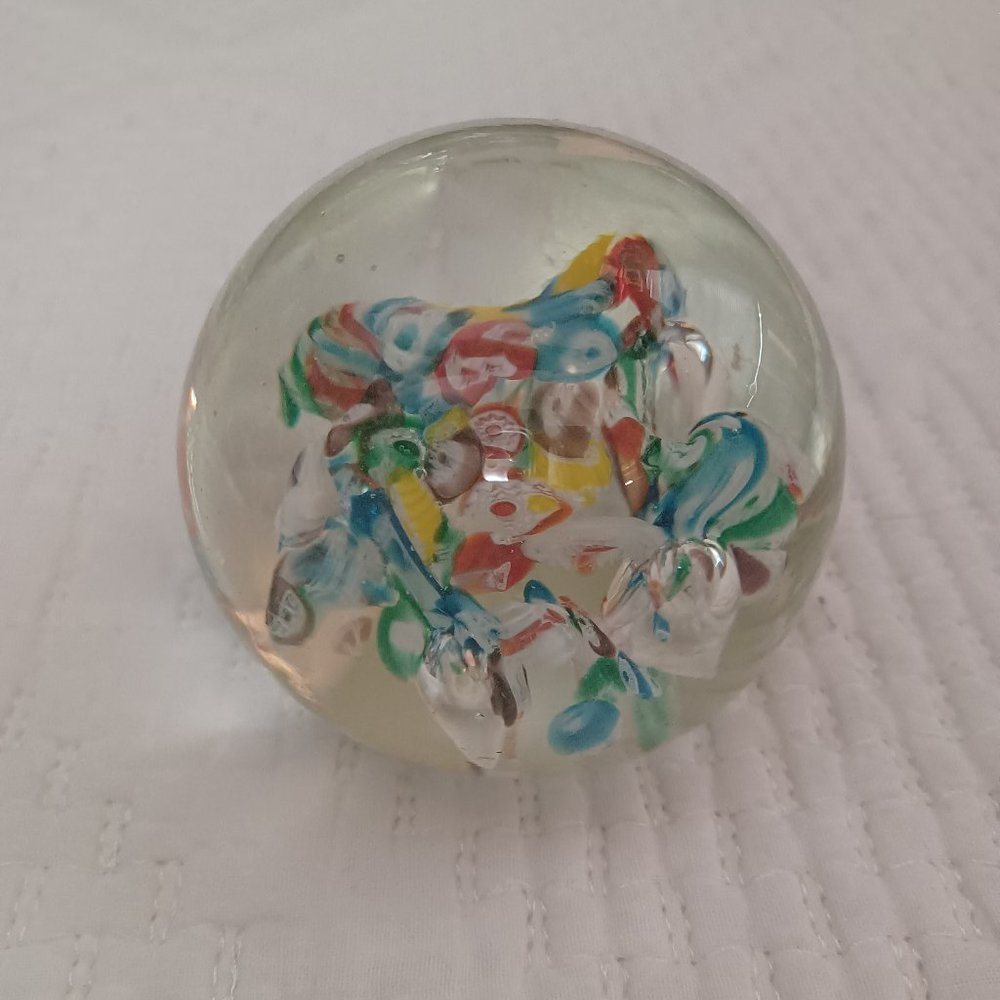 Glass paper-weight with star patterned bead design interior